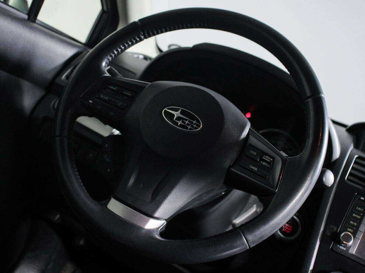 Б/У Субару ИксВи 2012 года. Фото: #19